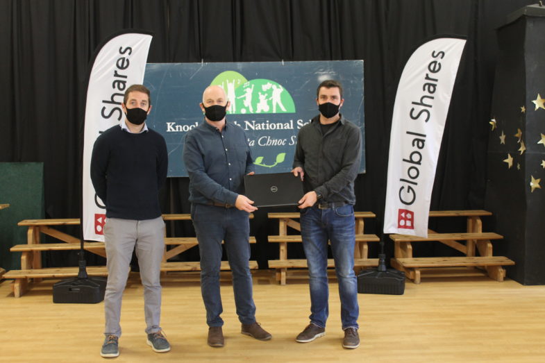 Laptop presentation to management | Kncoskeagh National School | Global Shares